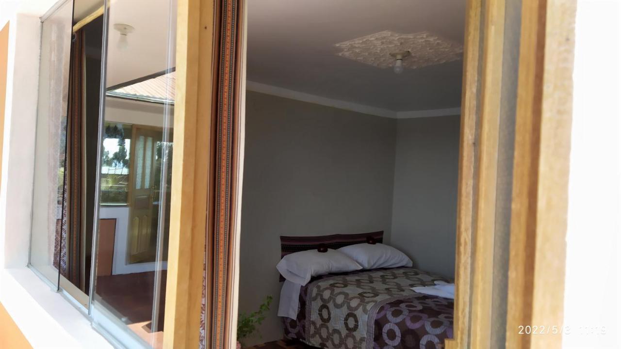 Tikawasi Homestay Comunidad Pueblo Isla Amantani Jose Luis Ocosuyo Eksteriør billede